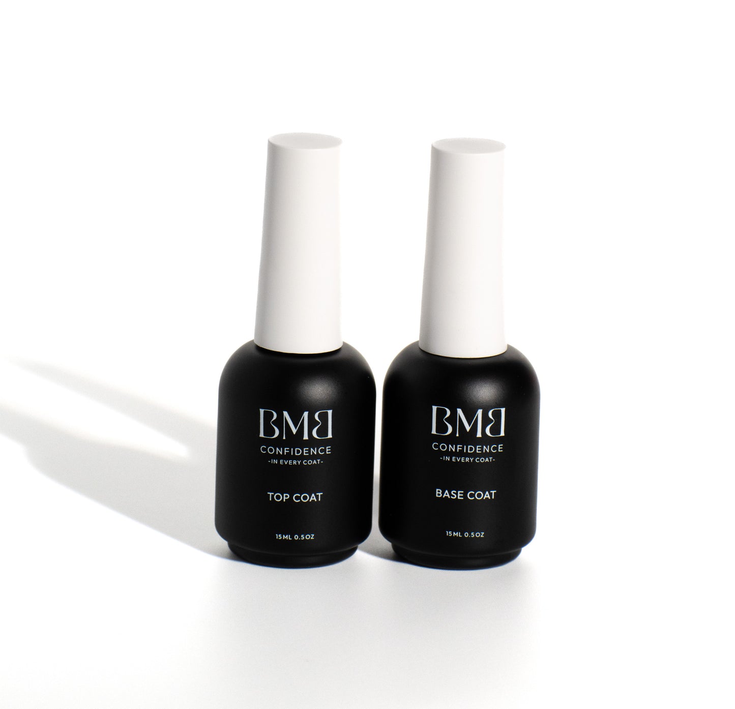 Two Bottles of a Top Coat and a Base Coat from the Essentials Bundle